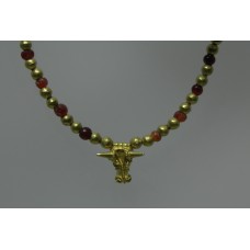 Gold adornments, bullhead pendant, red, gold beads